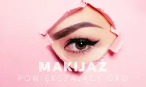 Zbliżenie na oko z makijażem, widoczne przez dziurę w różowym papierze.