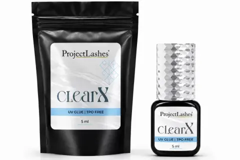Czarny woreczek i buteleczka z klejem do rzęs Project Lashes ClearX.